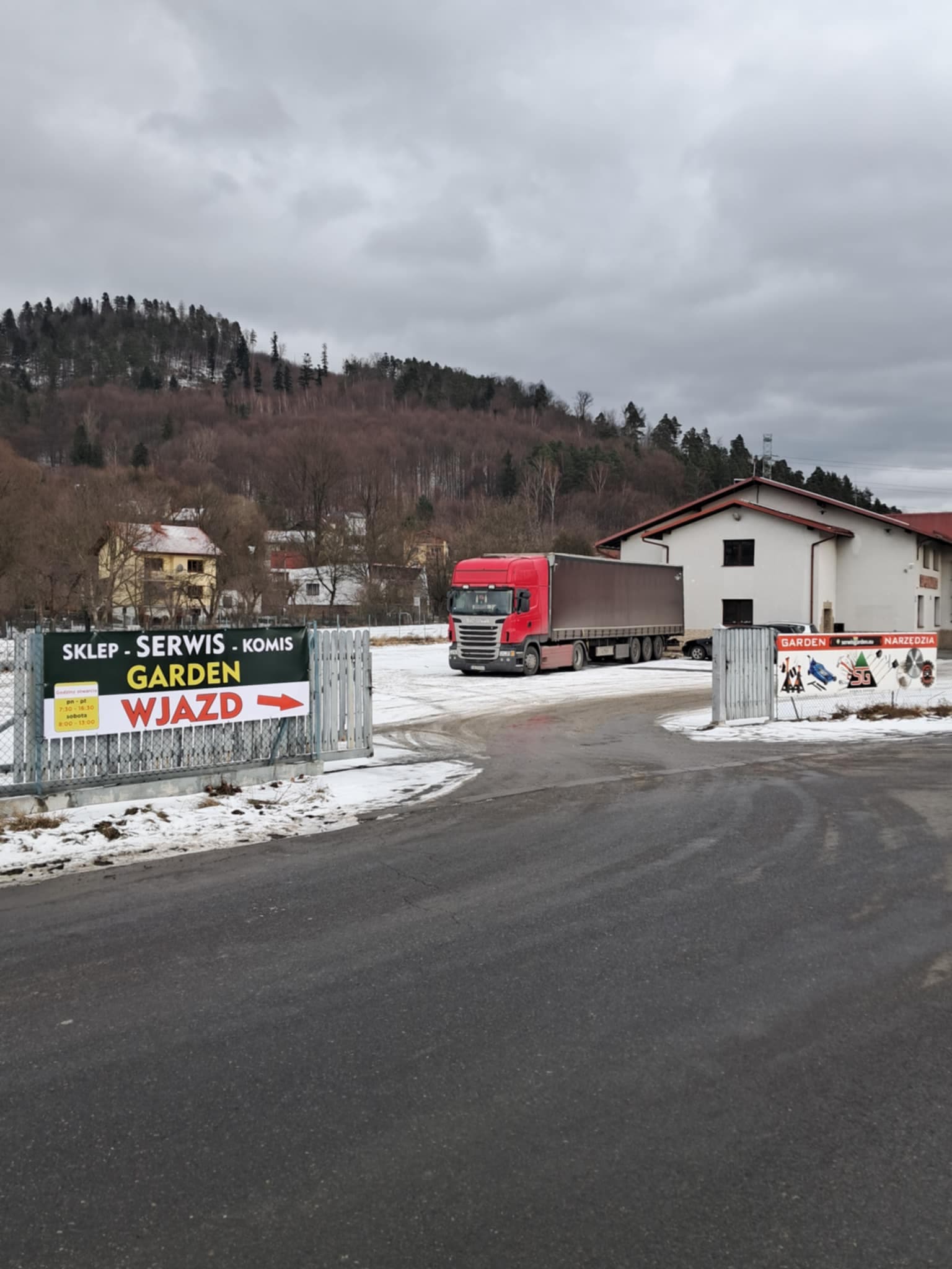 Modern lawn mower on perfectly cut green grass with sunlight